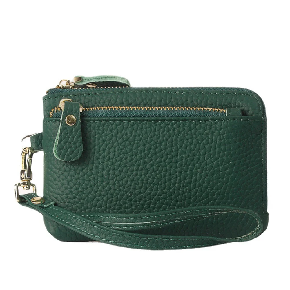 Porte-monnaie en cuir artisanal pour femme – Élégance et Artisanat Maroquinerie 5 Porte-monnaie vert en cuir véritable, fabrication artisanale, avec fermeture éclair et multiples couleurs disponibles