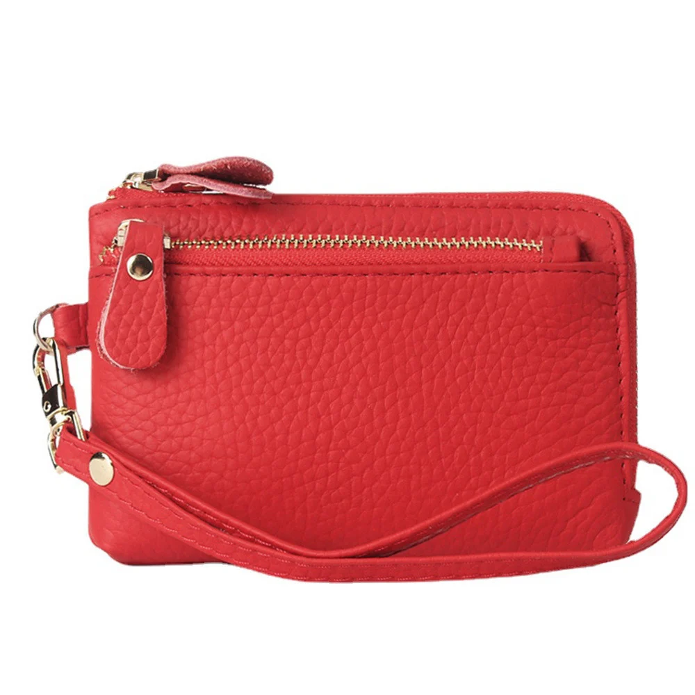 Porte-monnaie en cuir artisanal pour femme – Élégance et Artisanat Maroquinerie 3 Porte-monnaie rouge en cuir véritable, fabrication artisanale, avec fermeture éclair et multiples couleurs disponibles
