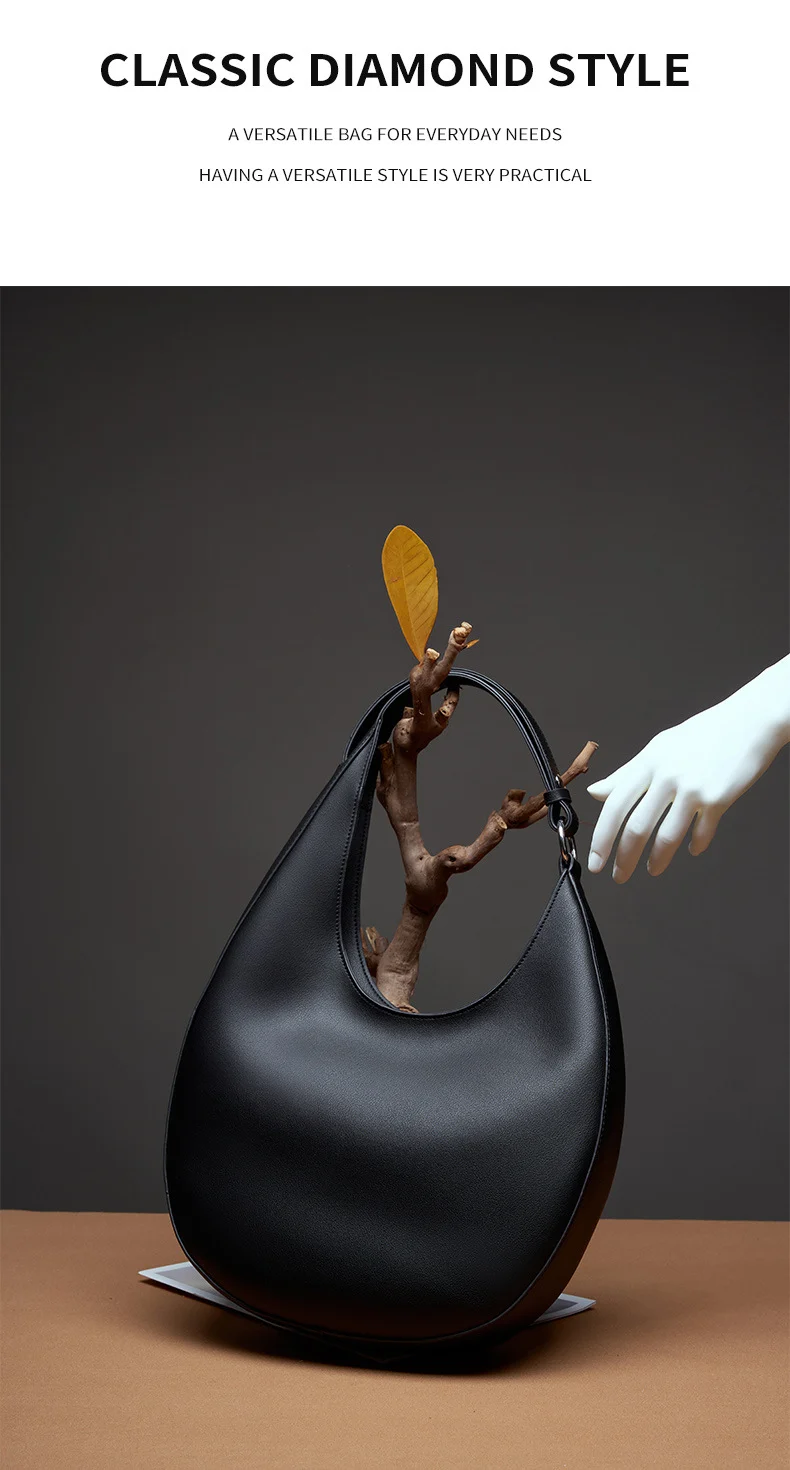 Sac à main demi-lune en cuir noir pour sorties en ville