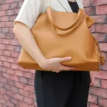 Sac Lucky En Cuir Plissé Pour Femmes Élégance Et Raffinement Marron