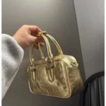 Sac crossbody en cuir gold, parfait pour des sorties stylées