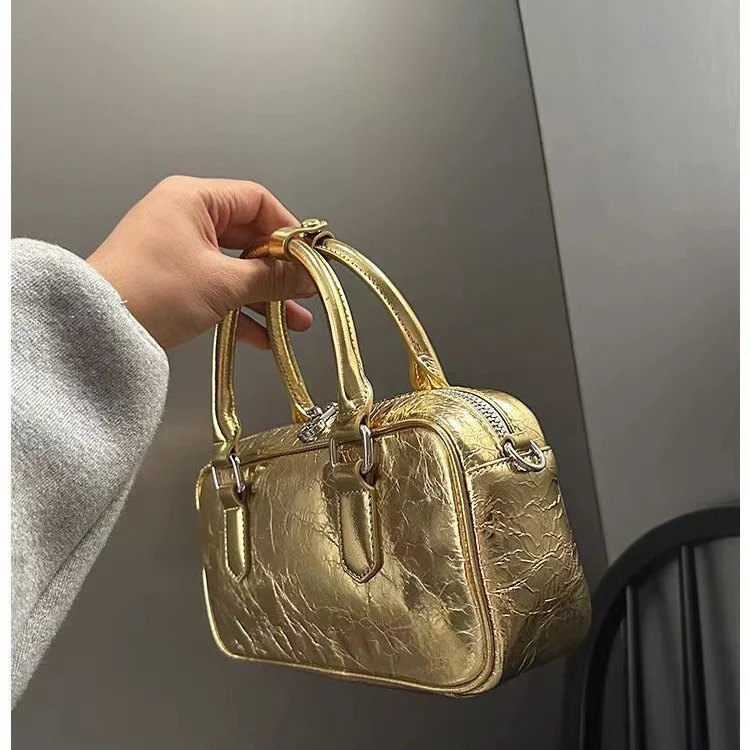 Sac crossbody en cuir gold, parfait pour des sorties stylées