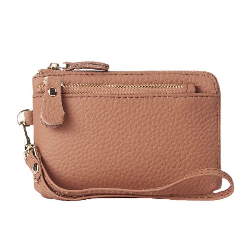 Porte-monnaie en cuir artisanal pour femme – Élégance et Artisanat Maroquinerie 8 Porte-monnaie rose en cuir véritable, fabrication artisanale, avec fermeture éclair et multiples couleurs disponibles