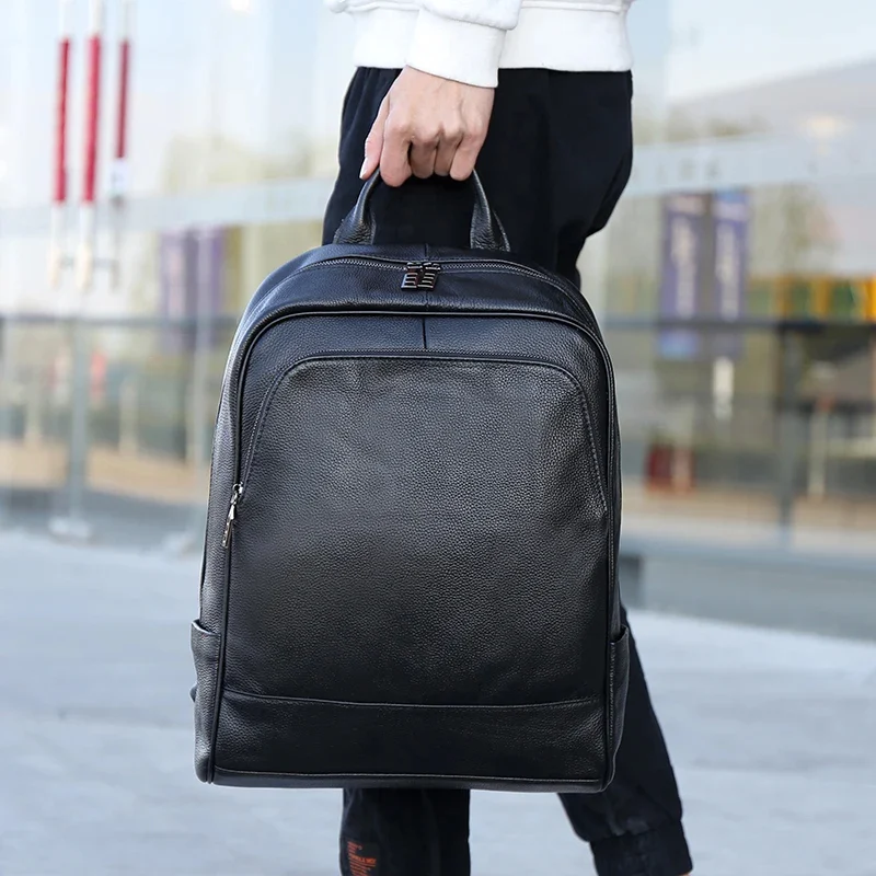 Sac à Dos de Voyage en Cuir Véritable - Élégance et Grande Capacité 2 Sac à dos de grande capacité en cuir véritable, idéal pour un usage professionnel